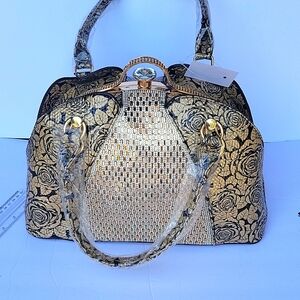 Golden bejeweled purse with detachable strap